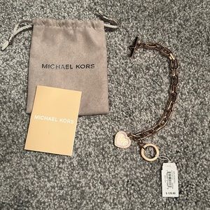 Brand new rose gold Michael Kors bracelet.